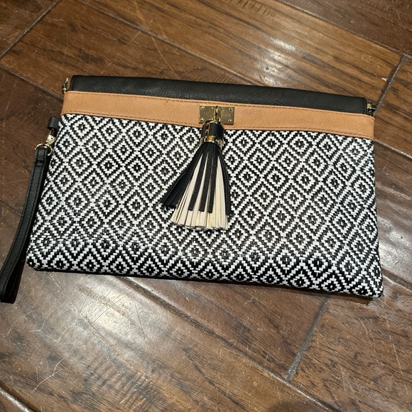 Aldo Handbags - Aldo Black and Tan Geometric Clutch